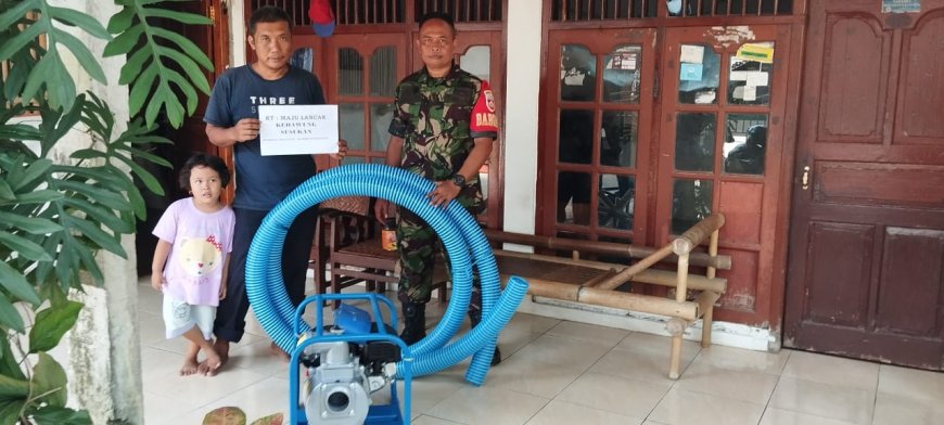 BABINSA IKUT SERTA DAMPINGI WARGA BINAAN DALAM RANGKA MENERIMA BANTUAN MESIN POMPA AIR